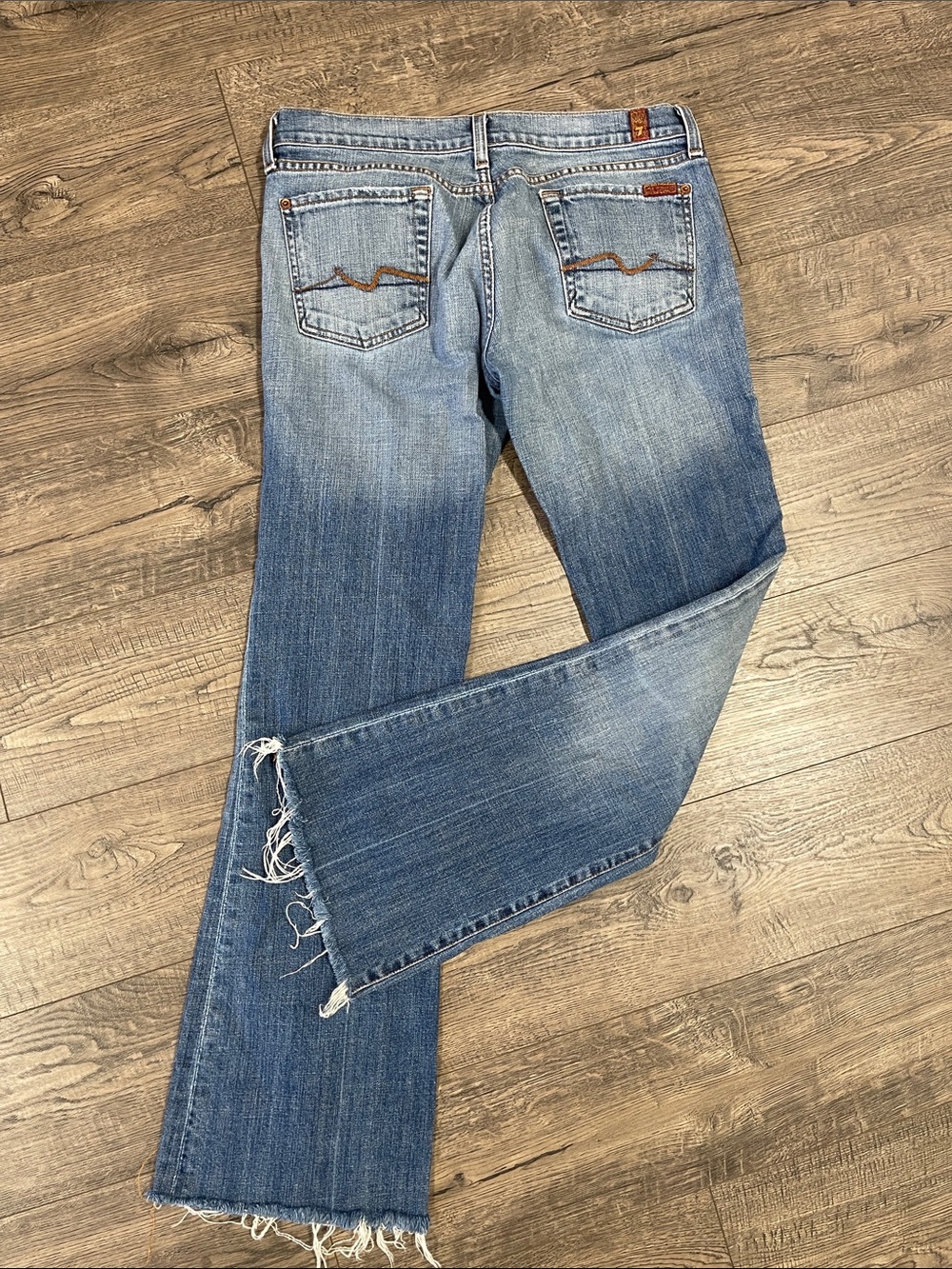 7 For All Mankind Medium Blue Flare Jeans with Raw Hem - Picture 4 of 6